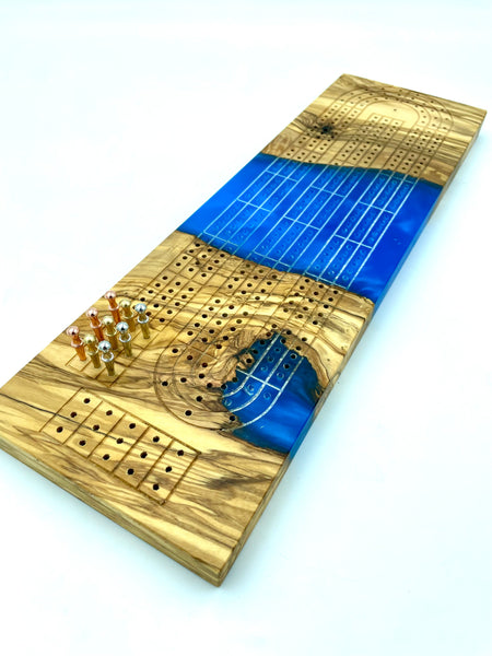 Incredible cribbage board of OLIVE WOOD + maui blue epoxy resin | metal pegs with storage included | engraving available