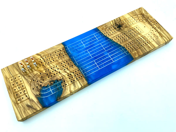 Incredible cribbage board of OLIVE WOOD + maui blue epoxy resin | metal pegs with storage included | engraving available